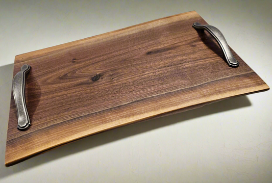 C. Walnut charcuterie board with handles, live edge