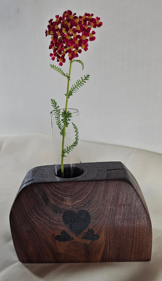 D. Walnut hand-shaped bud vase